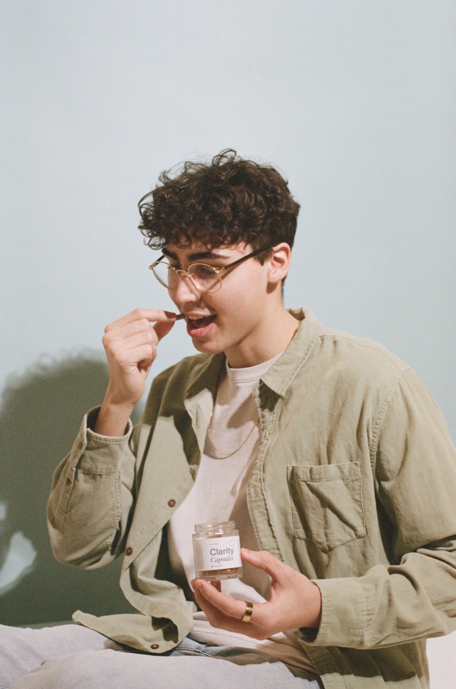 - Blog A person smiling in warm natural light, representing everyday curiosity about mushrooms and wellbeing