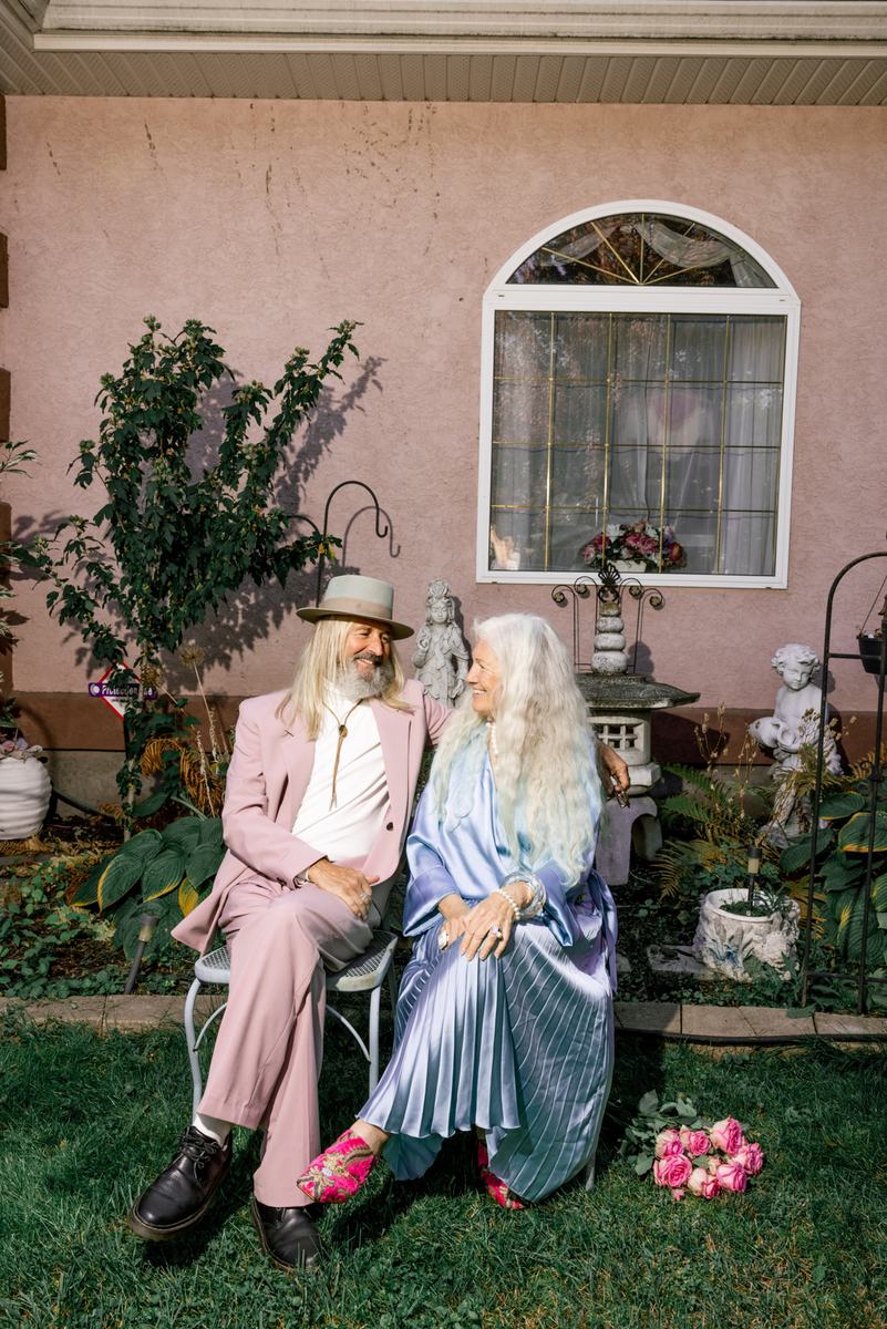 erg couple seated - Blog An older couple relaxing together in a garden on a bright day