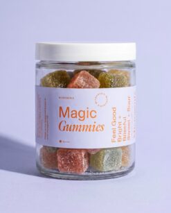 Microgenix Magic Gummies jar, Raspberry Lemonade and Apple sugared gummy cubes behind a periwinkle label