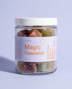 Microgenix Magic Gummies jar, five flavors of sugared gummy cubes behind a periwinkle label