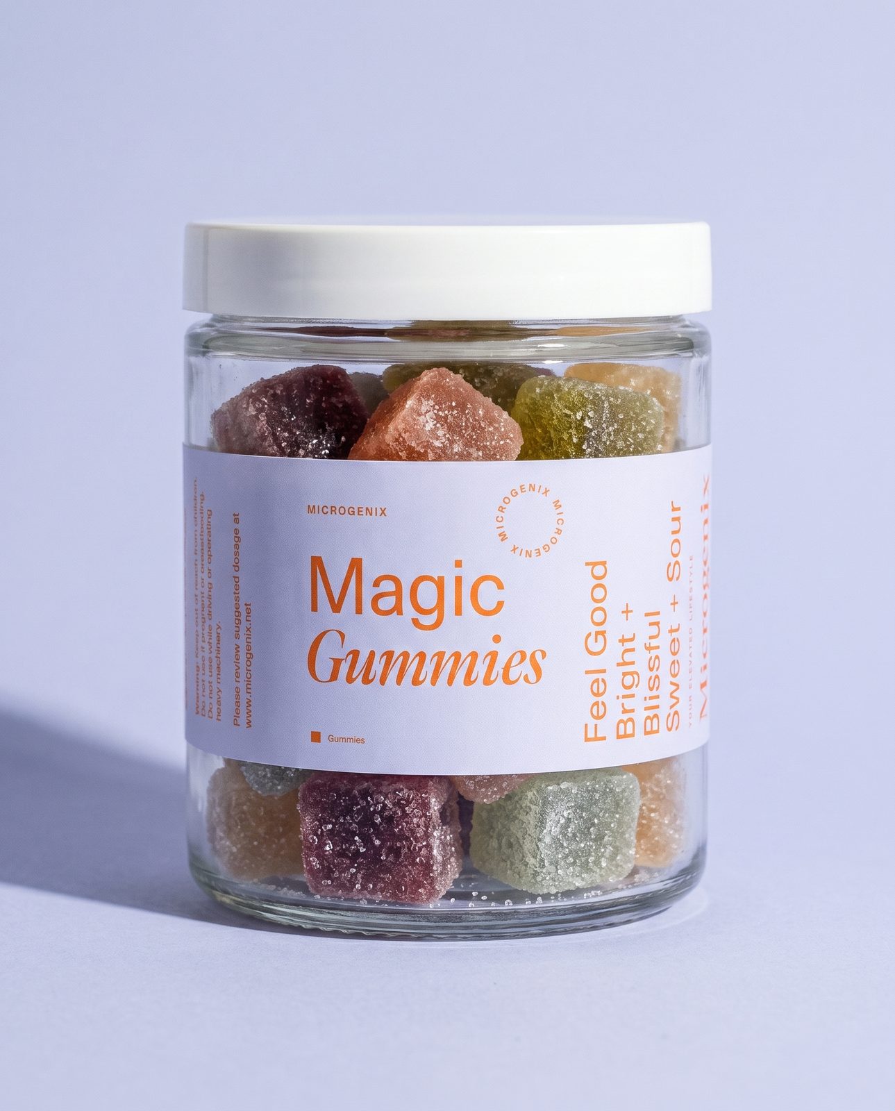 magic gummies jar - Microgenix Magic Gummies jar, five flavors of sugared gummy cubes behind a periwinkle label